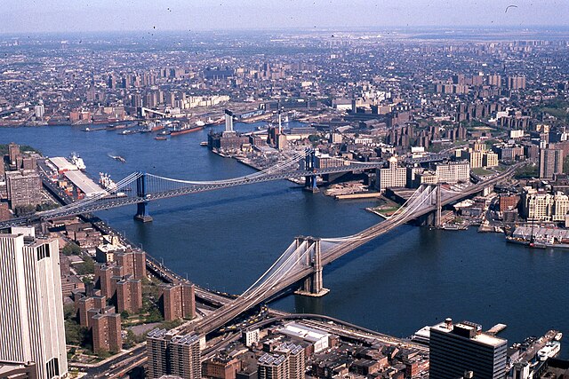 Manhattan_and_Brooklyn_bridges_on_the_East_River,_New_York_City,_1981